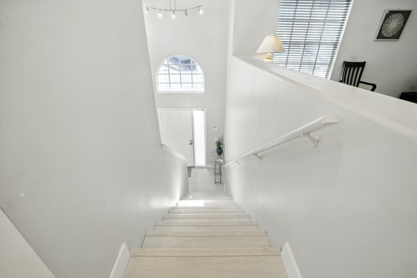 Elegant staircase inside Pinnacle, Unit 2503 townhome Naples Florida