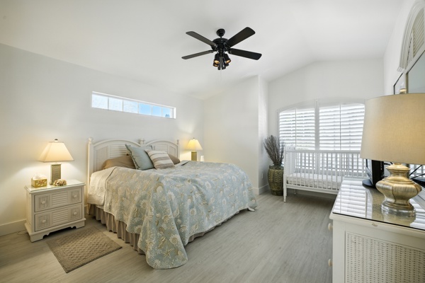 Bright spacious guest bedroom with king-size bed at Pinnacle, Unit 2503 luxury vacation rental Naples FL
