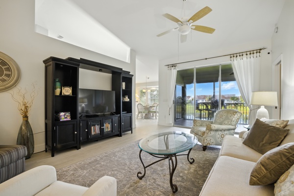 Living room with 65-inch flat screen Smart TV at Pinnacle, Unit 2503 Naples FL vacation home
