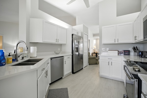 Renovated kitchen with updated appliances at Pinnacle, Unit 2503 Naples FL vacation home