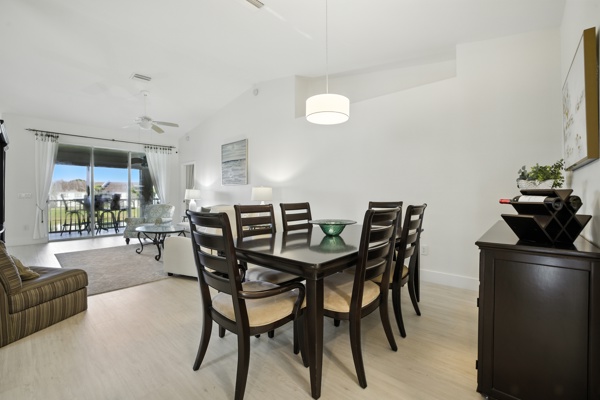 Dining area with table seating at Pinnacle, Unit 2503 Naples FL vacation home