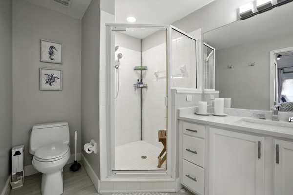 Master bathroom with walk-in shower at Pinnacle, Unit 2503 Naples FL luxury vacation rental