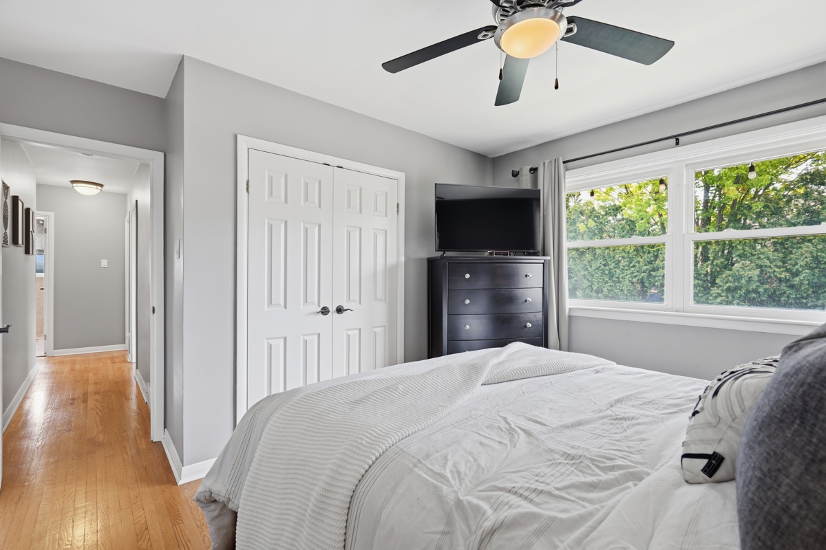 Bedroom with hardwood floors — East London