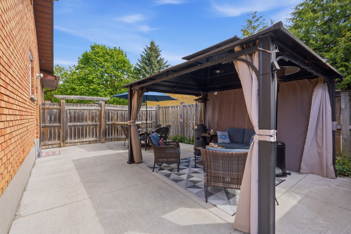 Concrete driveway with full access to backyard